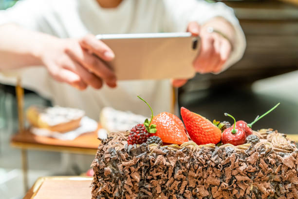 istock Young Asian female baker is working in the bakery 1282309139