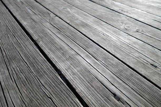 Old wooden terrace floor close-up with blur effect. Background and texture