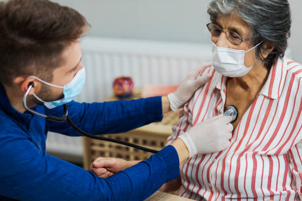 istock The doctor visiting the patient at home 1282312051