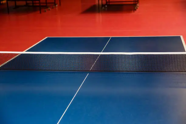 blue table for playing table tennis.table tennis net