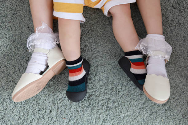 istock Childs wearing shoes 1282315765