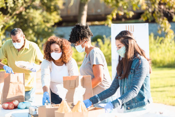 istock Diverse group sorts food to give away during coronavirus outbreak 1282319845