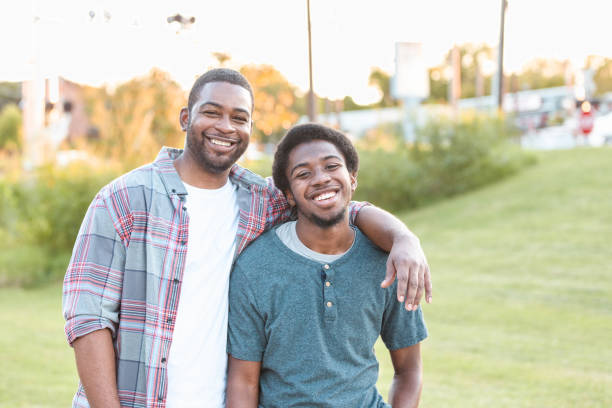 Father and son enjoy time together at park