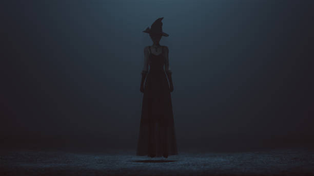 istock Witch with a Hat Floating Slightly Off the Ground in a foggy void 1282323066