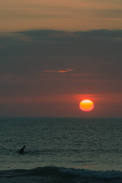 istock Sunset in a Iconic Kuta Beach, Bali 1282323911