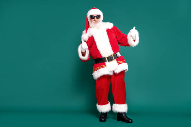 Santa Claus showing okay symbol. Christmas are coming! Real, crazy Santa Claus in sunglasses posing. bizarre fashion stock pictures, royalty-free photos & images