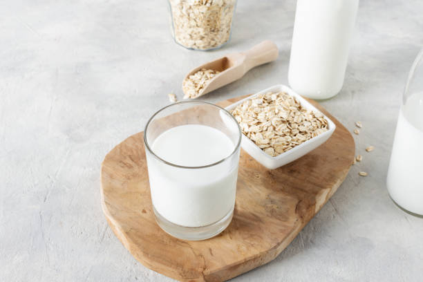 istock Homemade non dairy alternative milk made from oat flakes. 1282326231