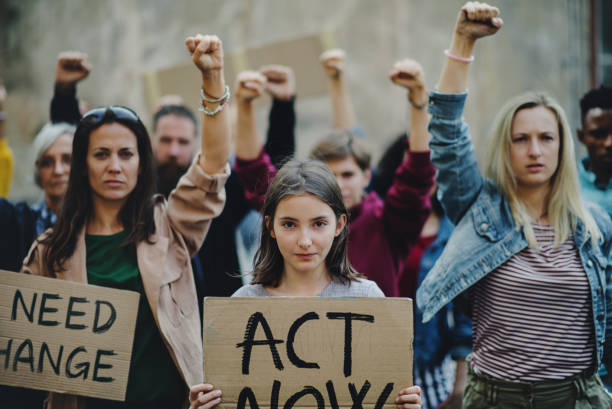 istock Group of people activists protesting on streets, strike and demonstration concept. 1282327658