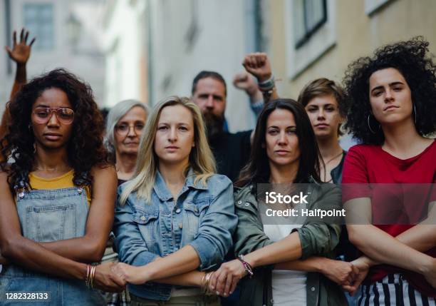 Group Of People Activists Protesting On Streets Women March And Demonstration Concept Stock Photo - Download Image Now