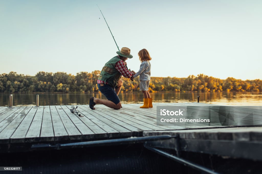 Today’s a good day for fishing Grandfather and grandson on a fishing adventure Fishing Stock Photo