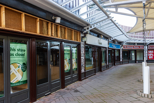 Ebbw Vale, Wales: Rows of permanently closed shops at Festival Park in the Welsh town of Ebbw Vale.  The new national lockdown is having a devastating effect on retail businesses