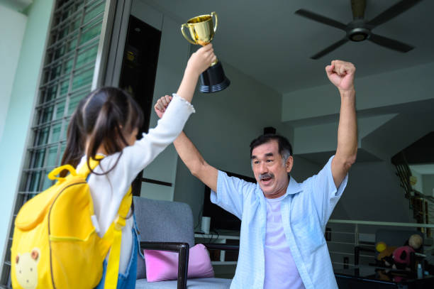 istock Grandpa…i am so happy to win 1st placing in my study again…Yeah! 1282330861