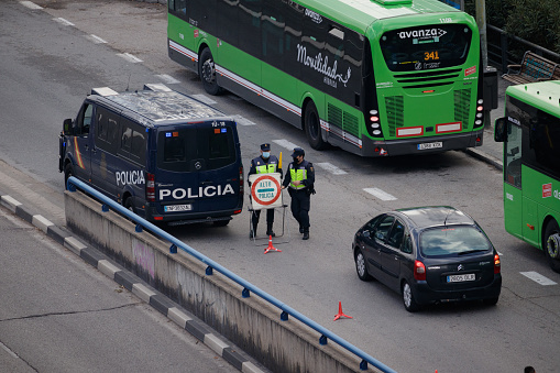 Madrid, Spain; October 24 2020: Police controls to prevent unwarranted mobility as a measure imposed to prevent the spread of COVID-19