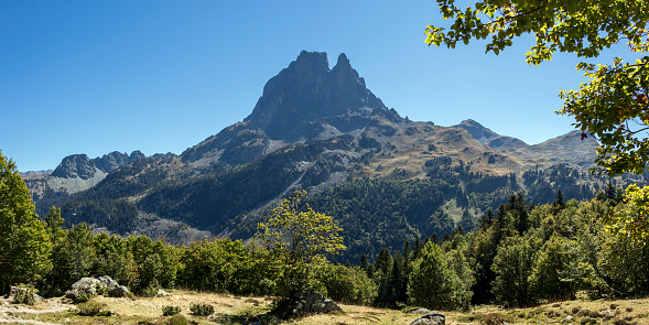 Panoramic view of scenic Ossau Valley and Pic du Midi d'Ossau mountain, Pyrenees National Park European nature landmark and popular tourist destination in France, Europe