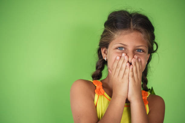 Close-Up Of Girl Picking Nose