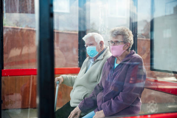 istock Wearing Our Masks for the Bus 1282337490