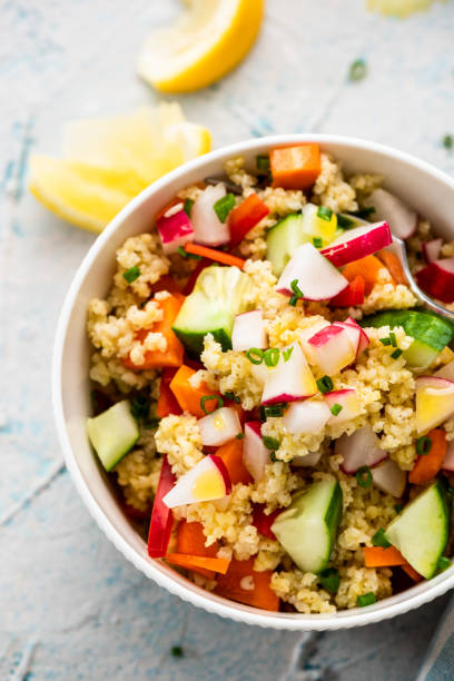 istock Colorful Fresh Couscous Salad Served in Bowl 1282338349