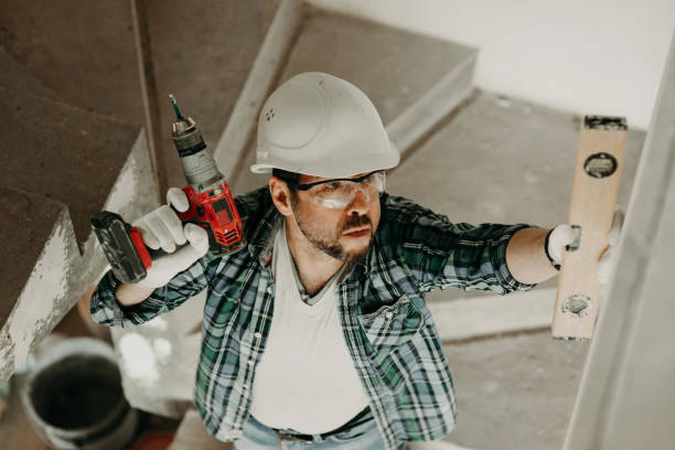 istock worker in safety helmet with building level 1282338822