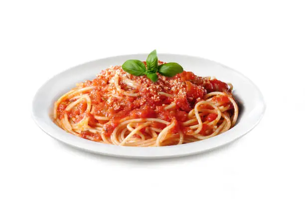 Italian Pasta with Tomato Sauce and Basil Leaves - Isolated on White Background