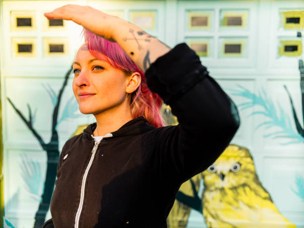 istock Female mural artist at work 1282340270