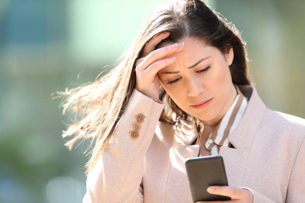 istock Sad entrepreneur complaining checking phone 1282341715