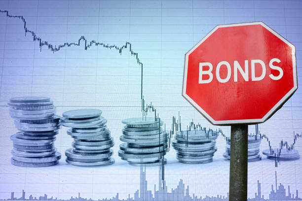 istock Bonds sign on economy background with graph and coins 1282342281