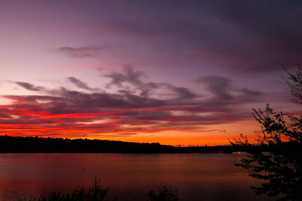 istock Amazing sunset in front of the water. 1282343647