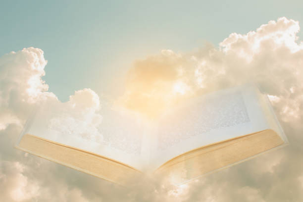 istock Bible opened up from heaven Double exposure. 1282345062