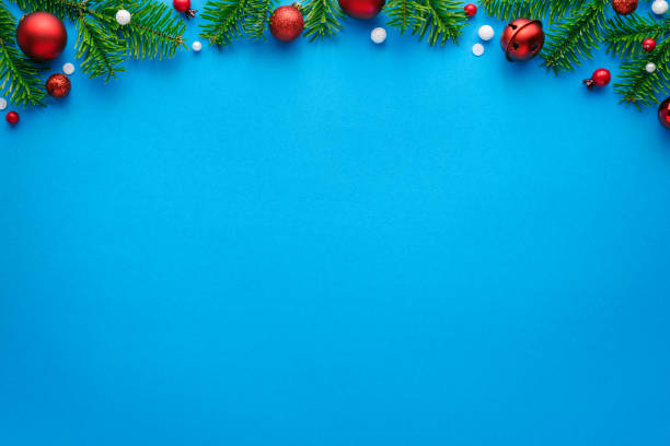 istock Christmas card with fir decorations on a blue background 1282345963