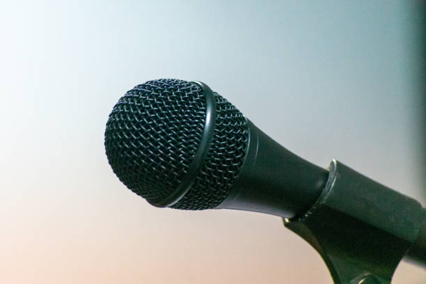 istock Selective focus shot of a microphone on a stand in a studio 1282347132