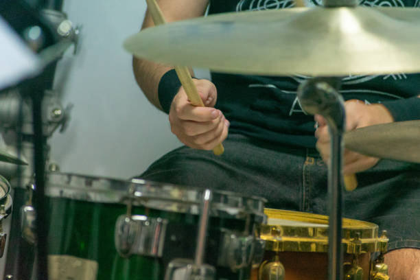 istock Selective focus shot of a drummer playing drums in a studio 1282348048