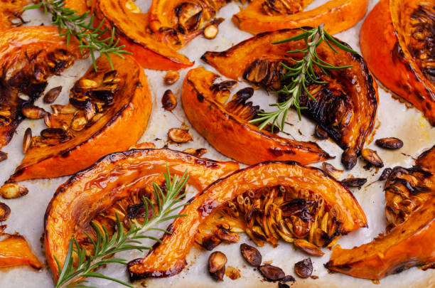istock Baked pumpkin slices with seeds 1282348550