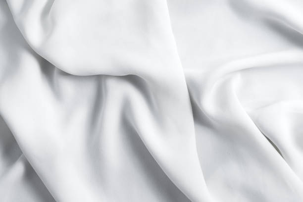 istock Crumpled textile fabric background of light grey color. 1282349857