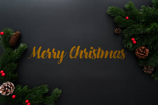 istock Christmas pine tree with xmas decoration on black background 1282350509