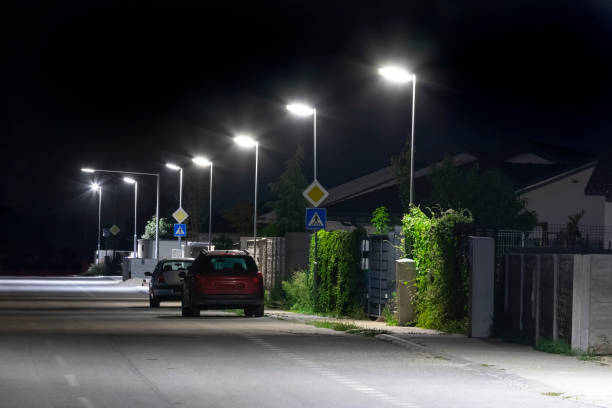 istock quiet night street with modern LED streetlights 1282352953