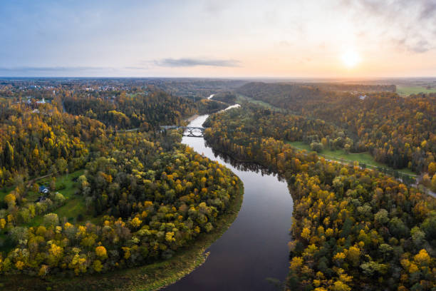 River Gauja next to Sigulda, Latvia River Gauja in autumn next to Sigulda, Latvia. Photo taken on from a drone latvia stock pictures, royalty-free photos & images