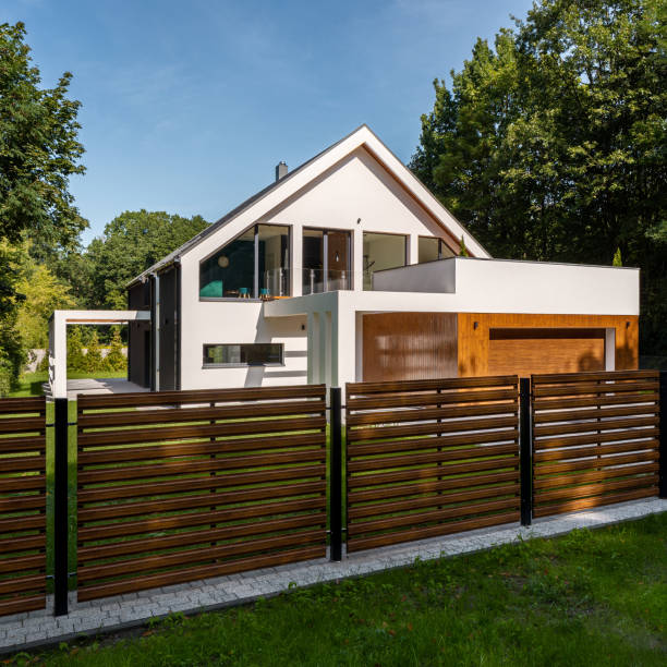 istock Modern house with wooden style fence 1282358943