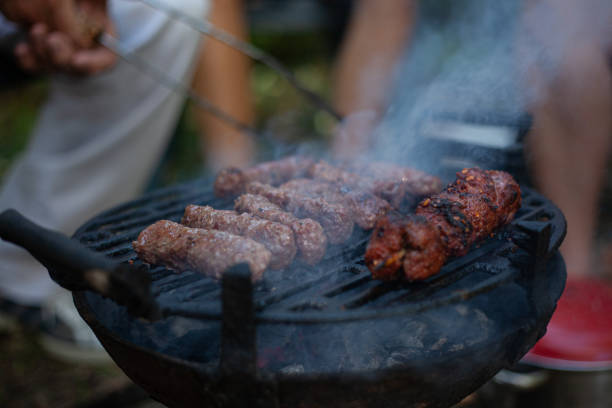 istock Extended family enjoying in the backyard preparing barbecue 1282362568