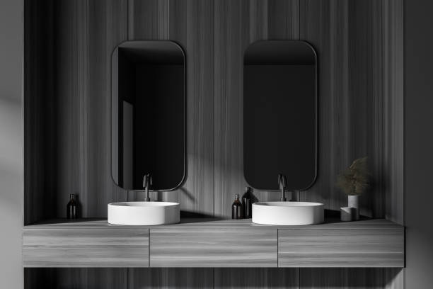 istock Stylish gray and wooden bathroom with double sink, close up 1282365249