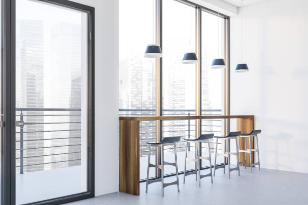 istock Panoramic white bar corner with wooden counter 1282368982