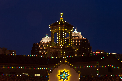 Christmas lights on the Country Club Plaza in Kansas City with the Century Towers in the background.