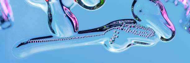 istock Abstraction on cosmetics, drops, air bubbles in neon. 1282374482