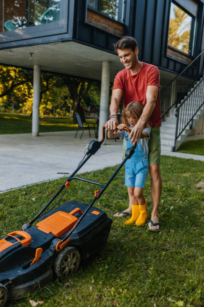 istock Who said mowing the lawn couldn't be fun? 1282375206