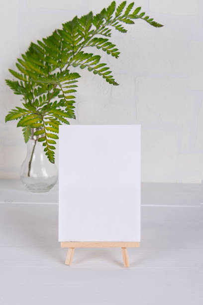 istock Greenery empty card mock up for wedding invitation, greeting card, place card 1282375354