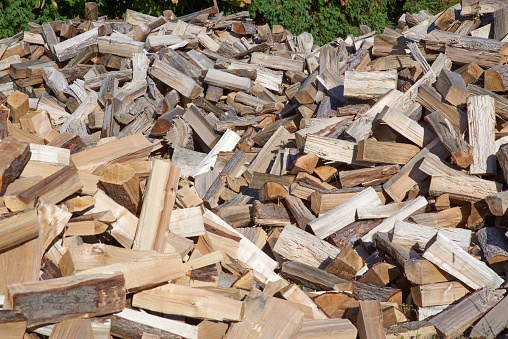 Piles of cordwood at landscape nursery ready for customer sales