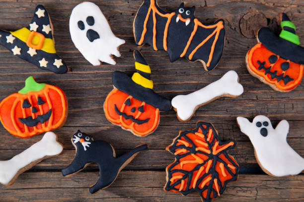 istock Halloween homemade gingerbread cookies on rustic wooden table 1282379218