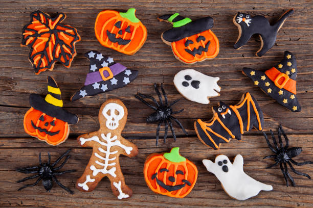 istock Halloween homemade gingerbread cookies on rustic wooden table 1282379222