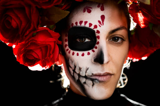 istock Sugar skull creative make up costume with rosses and lace for Halloween 1282379314