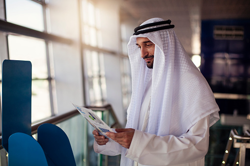 Sheik in Modern Metro Station in Dubai