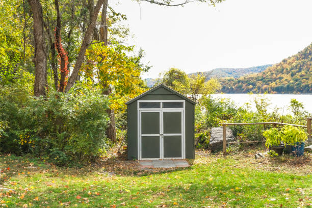 a storage shed in the lake - forest hut window autumn imagens e fotografias de stock